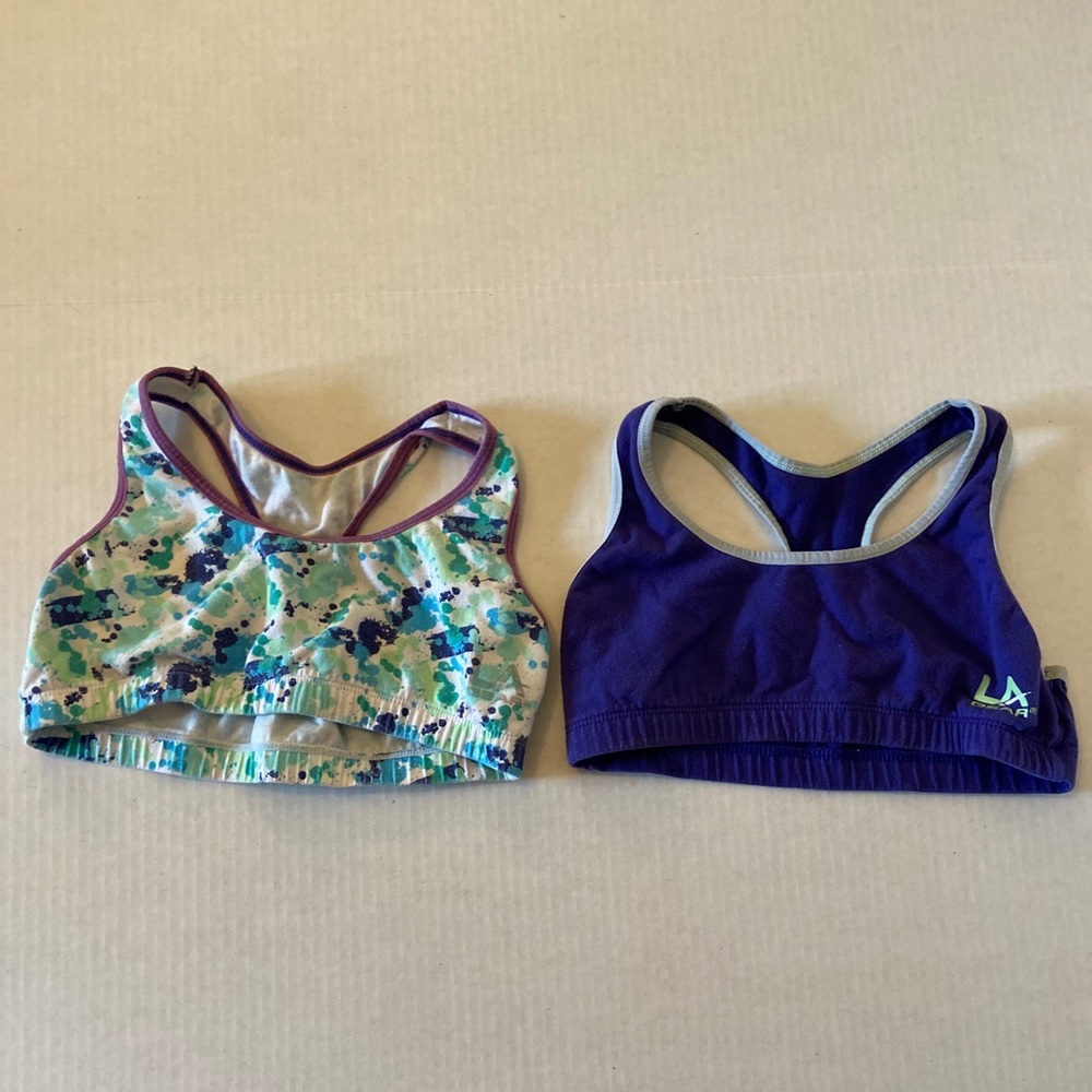 Two LA Gear kids sports bras